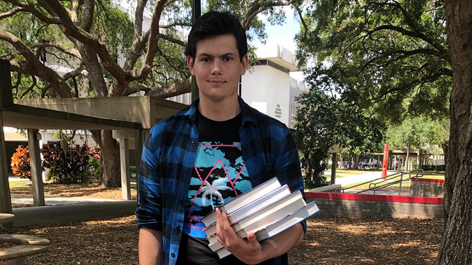 Miles Carson, 17, is the youngest student to receive a bachelor's degree from Polk State College. (Stephanie Claytor/Spectrum Bay News 9)