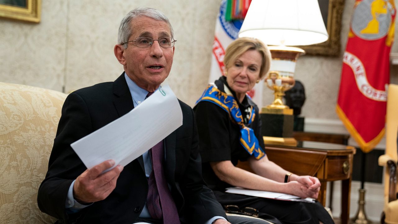 White House coronavirus response coordinator Dr. Deborah Birx listens as director of the National Institute of Allergy and Infectious Diseases Dr. Anthony Fauci speaks during a meeting between President Donald Trump and Gov. John Bel Edwards, D-La., about the coronavirus response, in the Oval Office of the White House, Wednesday, April 29, 2020, in Washington. (AP Photo/Evan Vucci)