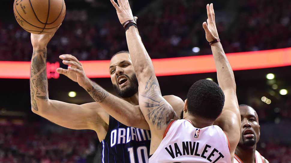 Orlando Magic guard Evan Fournier (10) controls the ball as Toronto Raptors guard Fred VanVleet (23) defends during the second half in Game 1 of a first-round NBA basketball playoff series in Toronto, Saturday, April 13, 2019. (Frank Gunn/The Canadian Press via AP)