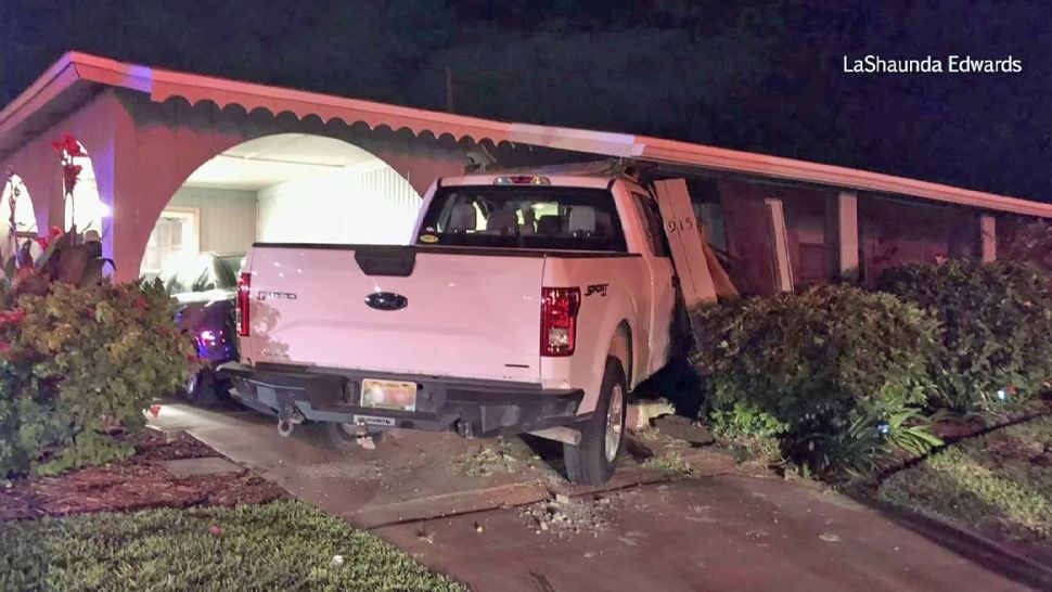 Stolen pickup truck crashes into Brevard County home