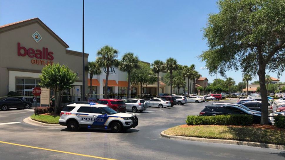 Orlando Police officers cordon off a shopping center on Colonial Drive and Bumby Avenue on Monday afternoon. (Orlando Police)