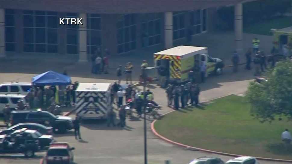 A triage has been set up in front of Santa Fe High School following a school shooting that left 10 dead and 10 injured. (CNN affiliate)