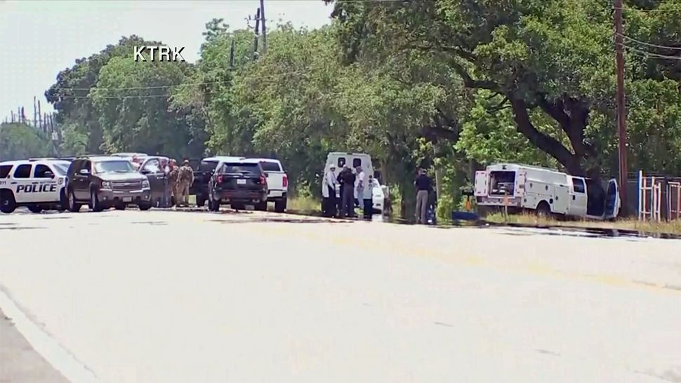 Law enforcement is investigating a shooting scene after multiple people died at Santa Fe High School in the Houston area on Friday, May 18, 2018. (CNN affiliate)