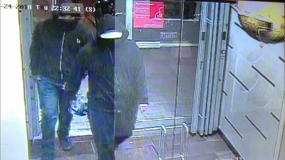 Peel Region Sergeant Matt Bertram said the two men had their faces covered to conceal their identity when they entered the Bombay Bhel restaurant, where a bomb went off. (Peel Regional Police) 
