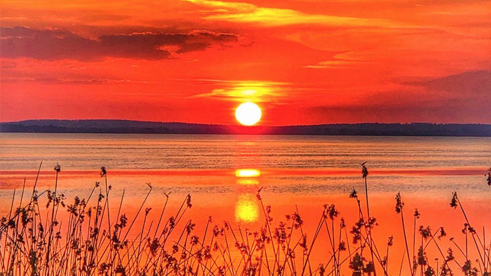 Sent to us with the Spectrum News 13 app: This vibrant sunset took place at Lake Apopka at Newton Park in Winter Garden on Thursday, May 30, 2019. (Photo courtesy of Sherry Straus, viewer)