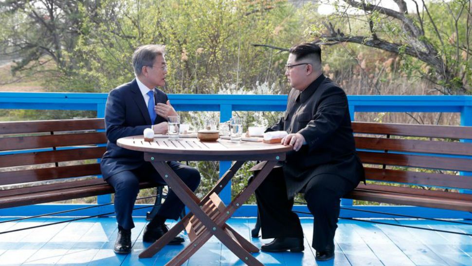 FILE - In this April 27, 2018 file photo, North Korean leader Kim Jong Un, right, and South Korean President Moon Jae-in talk at the border village of Panmunjom in the Demilitarized Zone, South Korea. (Korea Summit Press Pool via AP, File)