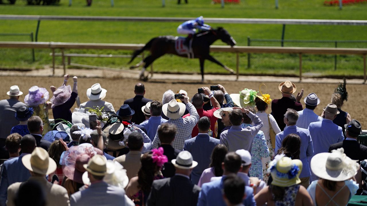 Normal Kentucky Derby Capacity crowd, big hats, mint juleps