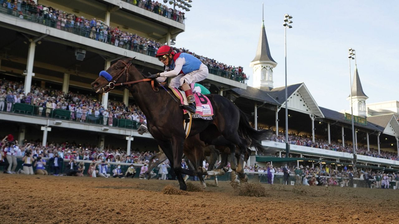 medina spirit crossing the finish line at Churchill Downs