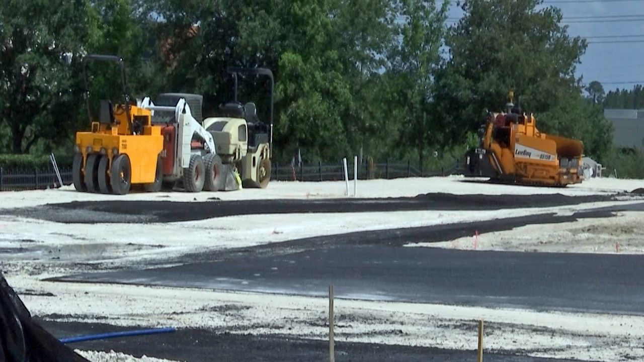 Investigators said 72-year-old Ulysses Tolbert of Deltona was driving the paver to another area of the parking lot when he fell out and was partially run over. (Matt Fernandez, staff)