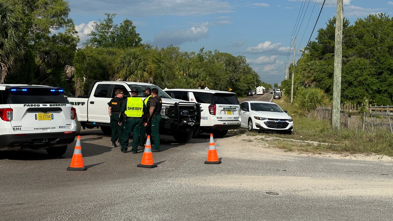 Investigators with the Pasco County Sheriff's Office say a woman was shot by deputies after she allegedly confronted them with a knife Thursday afternoon in the area of Denton Avenue and Dane Lane in Hudson. (Spectrum Bay News 9/Matt Infante)