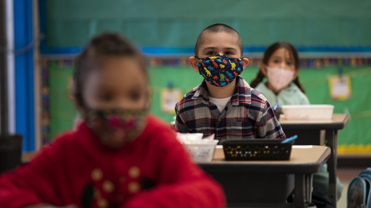 Kindergarten students sit in their classroom on the first day of in-person learning at Maurice Sendak Elementary School in Los Angeles, Tuesday, April 13, 2021. (AP Photo/Jae C. Hong)