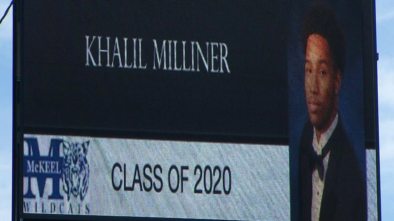 Khalil Milliner's mom surprised him with a graduation billboard on U.S. Highway 98.(Stephanie Claytor/Spectrum Bay News 9)
