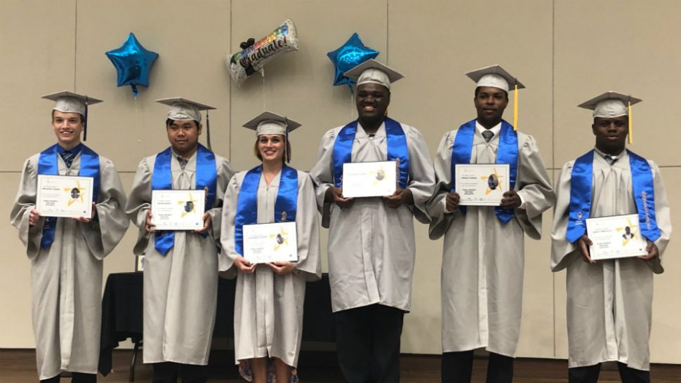 This year, six students graduated from the transitional program, which prepares students with disabilities for the workforce. (Stephanie Claytor/Spectrum Bay News 9)