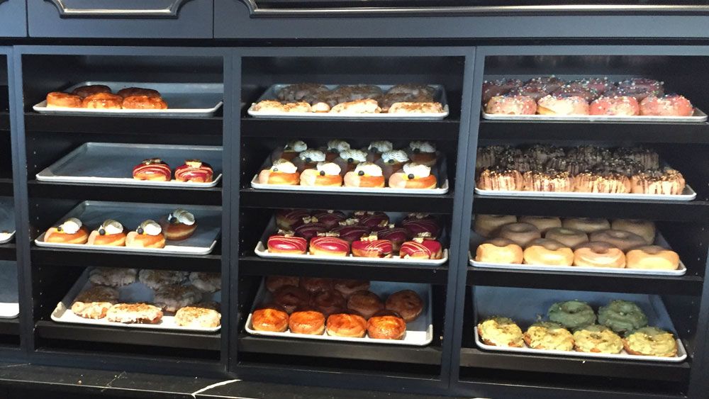 Decadent doughnuts on the shelves at The Glass Knife in Winter Park. (Christie Zizo, Staff)