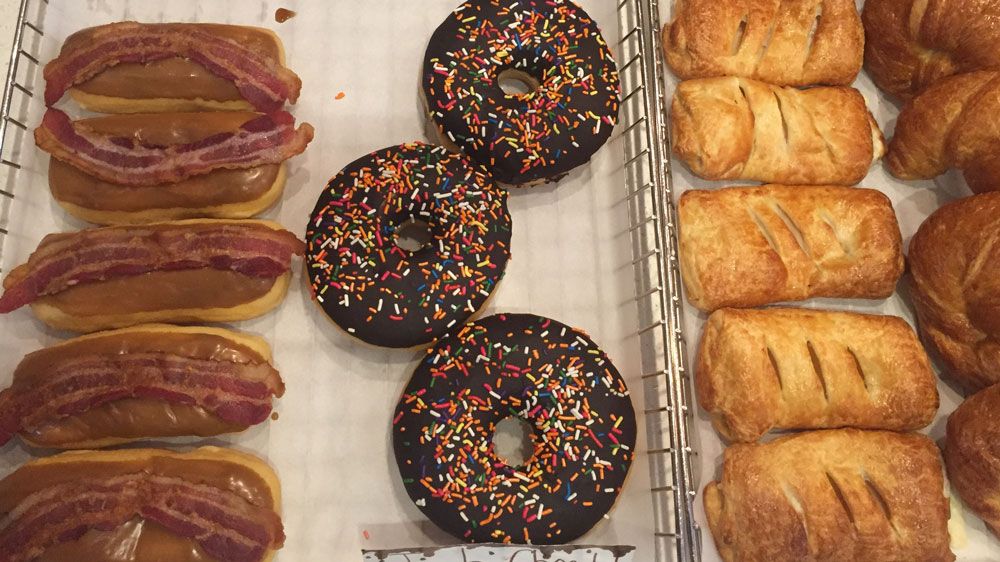 Donut Central's maple bacon doughnuts and other pastries. (Christie Zizo, Staff)