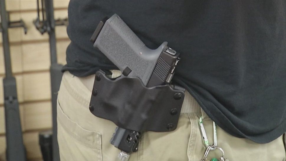 (Generic image of gun in holster on unidentified man's hip)