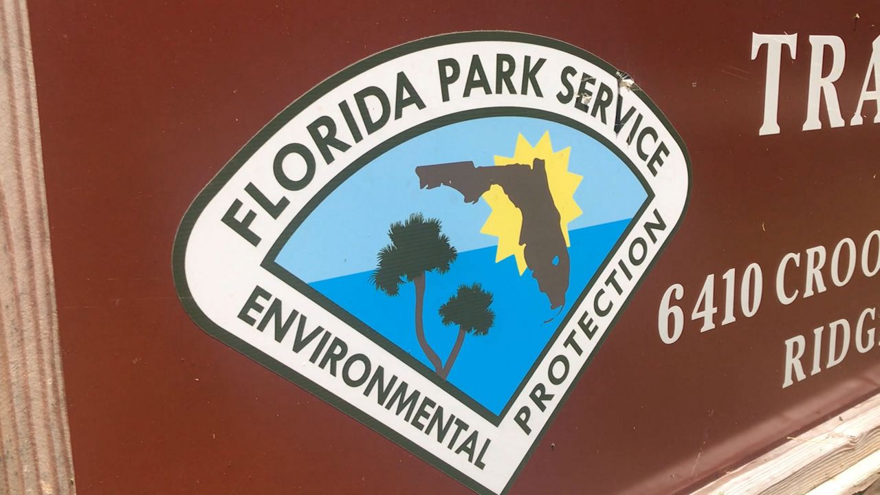 Florida Park Service logo on an exterior sign. (Kim Leoffler/Spectrum Bay News 9)