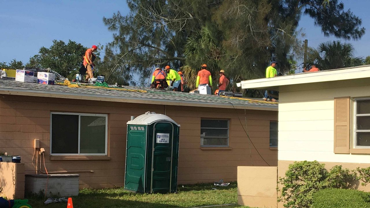 The Wandstrats are the 11th family to receive a new roof from Arry's Roofing Services. (Jorja Roman/Spectrum Bay News 9)