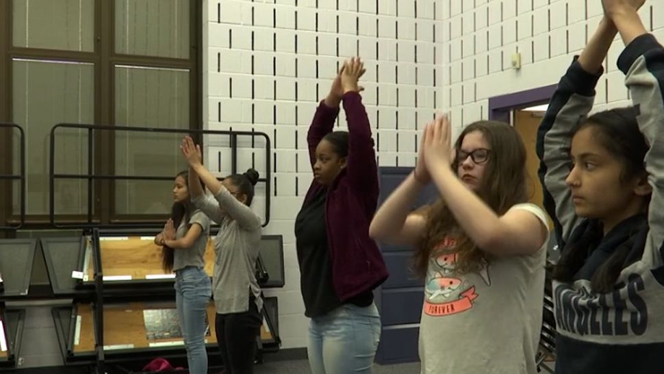 School Yoga Class Helps Students Take the Edge Off