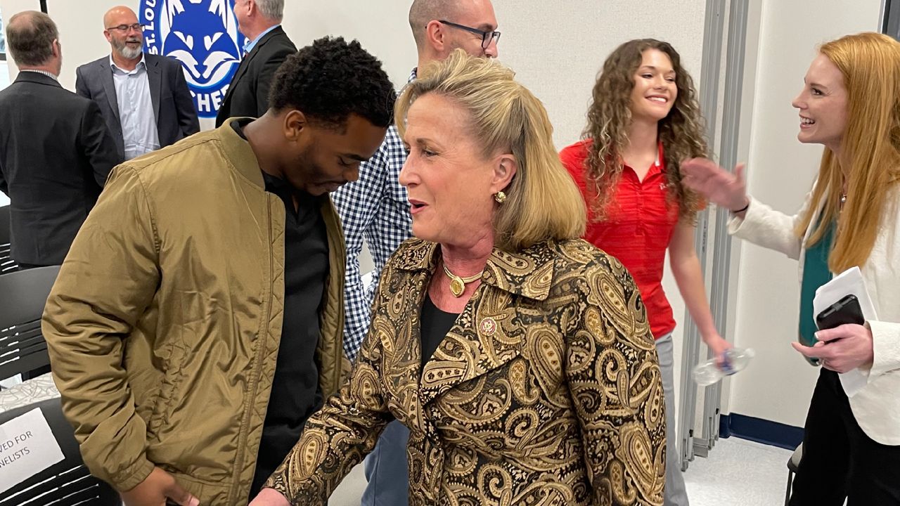 U.S. Rep Ann Wagner, R-MO, visits with attendees at a St. Louis Community College celebration of a school program that can lead to jobs with Boeing.