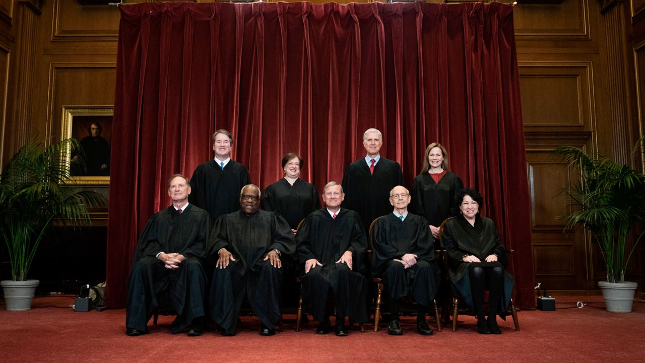 Members of the Supreme Court pose for a group photo at the Supreme Court in Washington, April 23, 2021. (Erin Schaff/The New York Times via AP, Pool, File)
