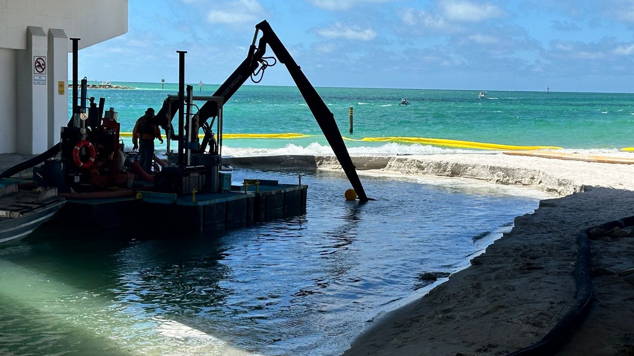 11,000 cubic yards of 'false beach' removed from John's Pass