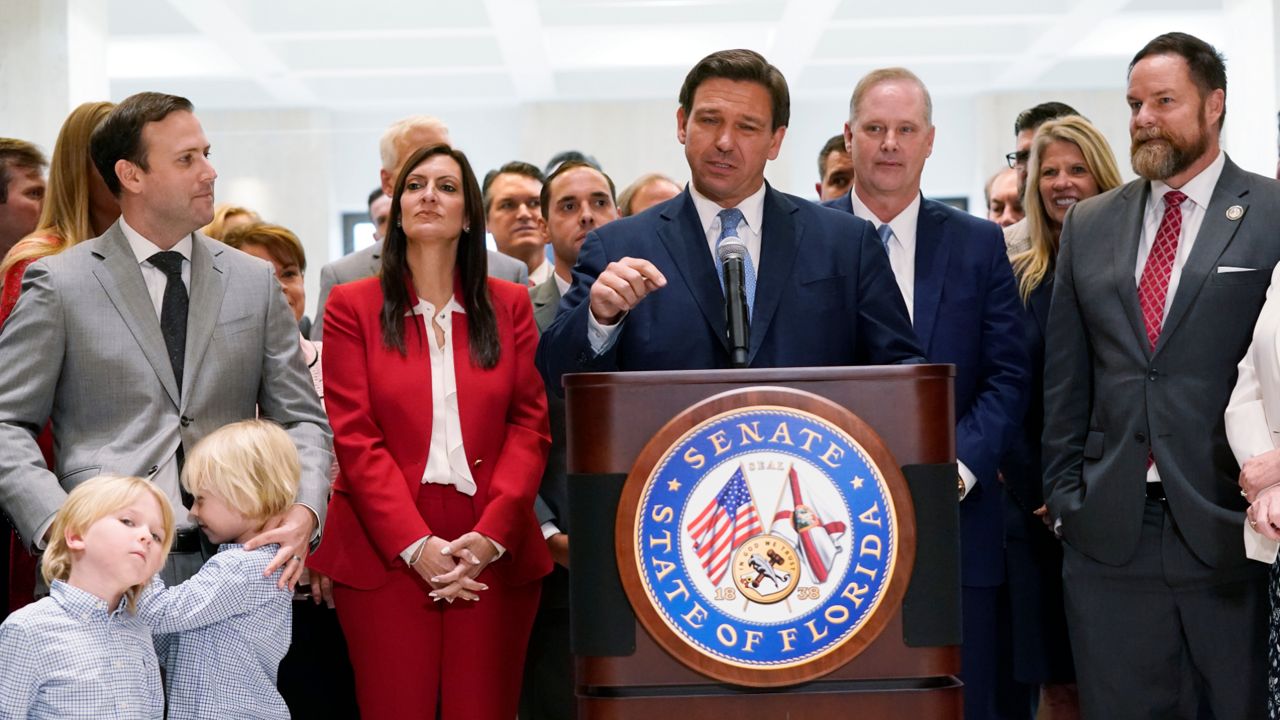 In this file photo from Friday, April 30, 2021, Gov. Ron DeSantis speaks at the end of the 2021 legislative session at the Florida Capitol in Tallahassee. (AP Photo/Wilfredo Lee)