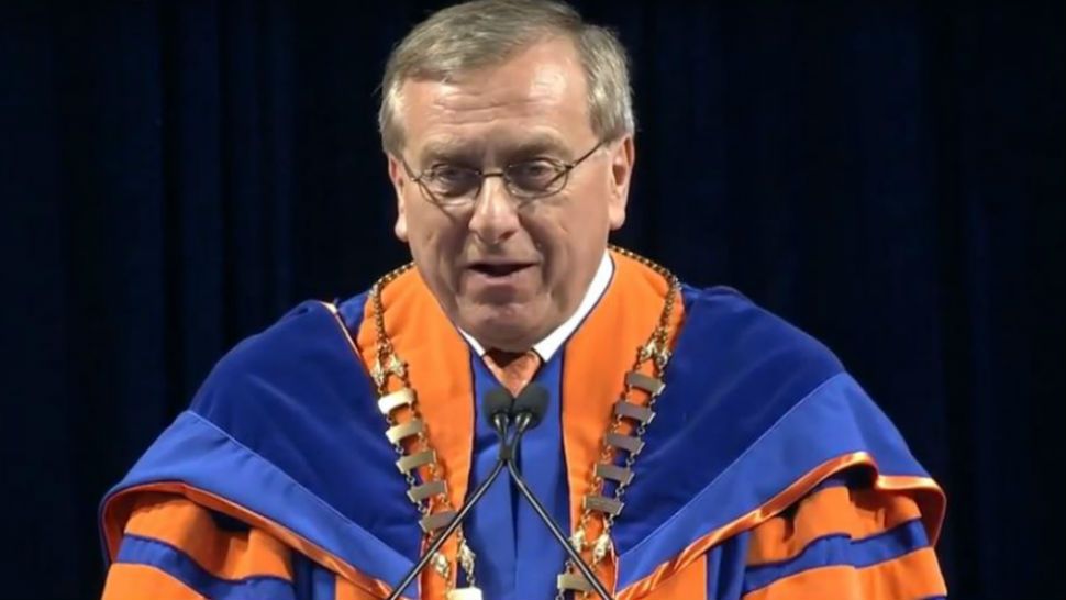 University of Florida president W. Kent Fuchs issued an apology after graduates were aggressively rushed off stage Saturday. (UF/YouTube)