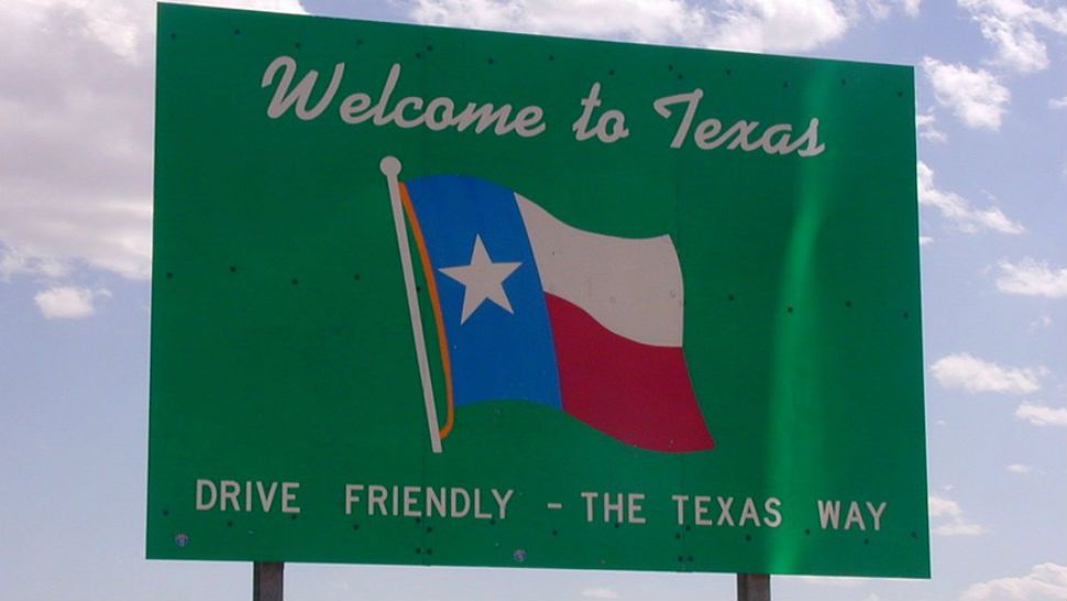 FILE- Welcome to Texas sign.