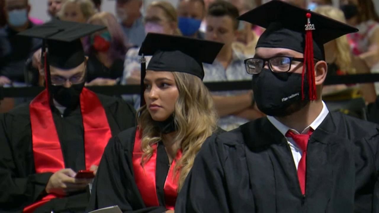 University of Tampa students walk in own commencement