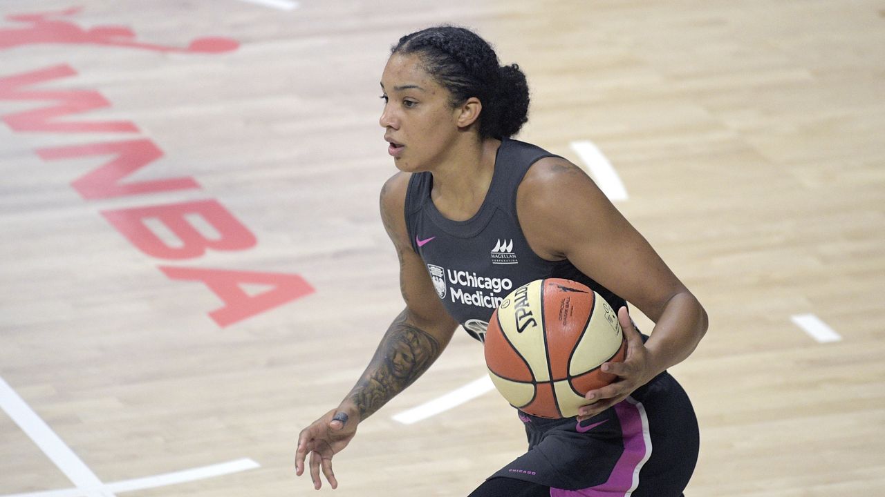 Chicago Sky forward Gabby Williams brings the ball up the court during the first half of a WNBA basketball game against the New York Liberty, Tuesday, Aug. 25, 2020, in Bradenton, Fla. (AP Photo/Phelan M. Ebenhack)