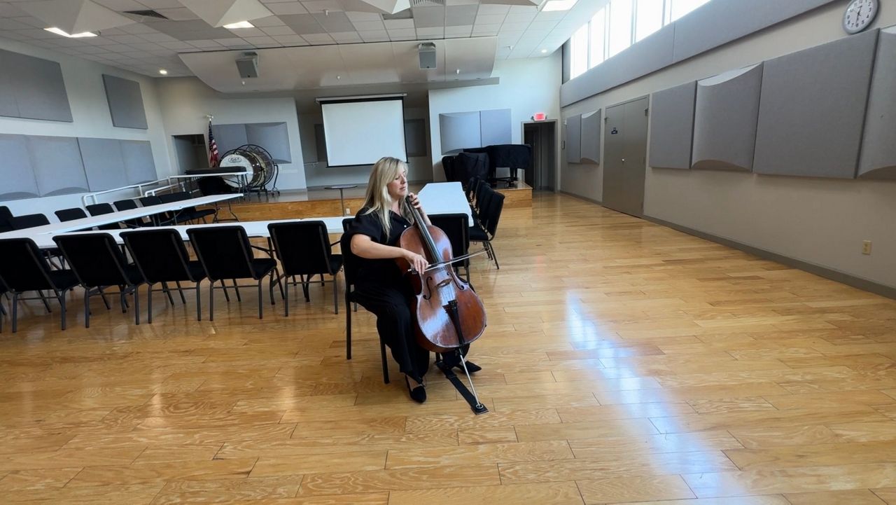 Natalie Helm plays her cello. She is a principal cello at Sarasota Orchestra. (Spectrum Bay News 9/Julia Hazel)