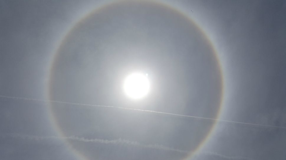 Giant ring around the sun, called a sun halo, seen over Merritt Island on Thursday.