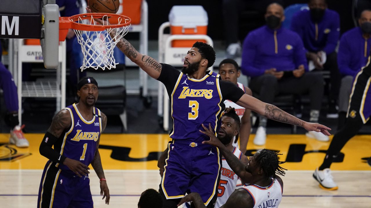 Los Angeles Lakers unveil 2020 NBA championship banner, stay alive