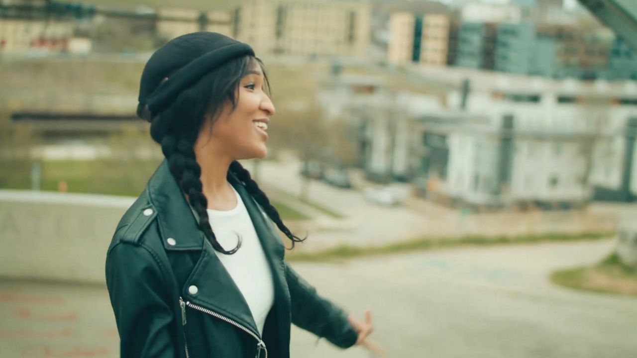 Singer Donna Re'nee performs outdoors in her music video