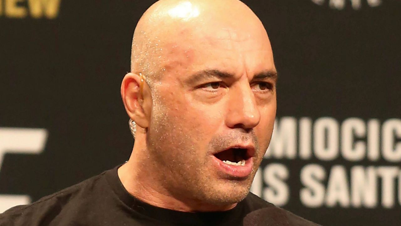 Joe Rogan is seen during a weigh-in before UFC 211 on May 12, 2017, in Dallas before UFC 211. (AP Photo/Gregory Payan, File)