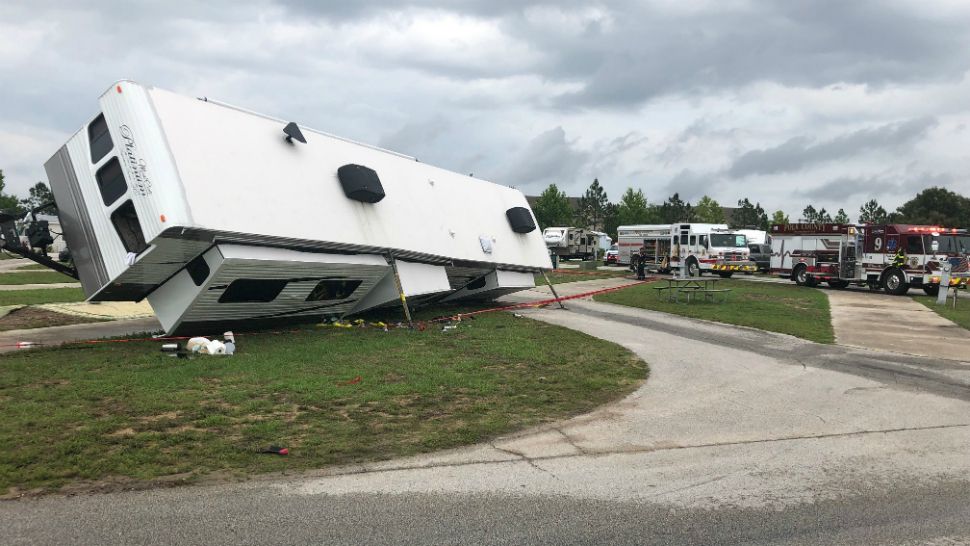 High winds toppled an RV at the Lake Magic RV Resort in the Four Corners area Tuesday afternoon. (Courtesy of Polk County Fire)