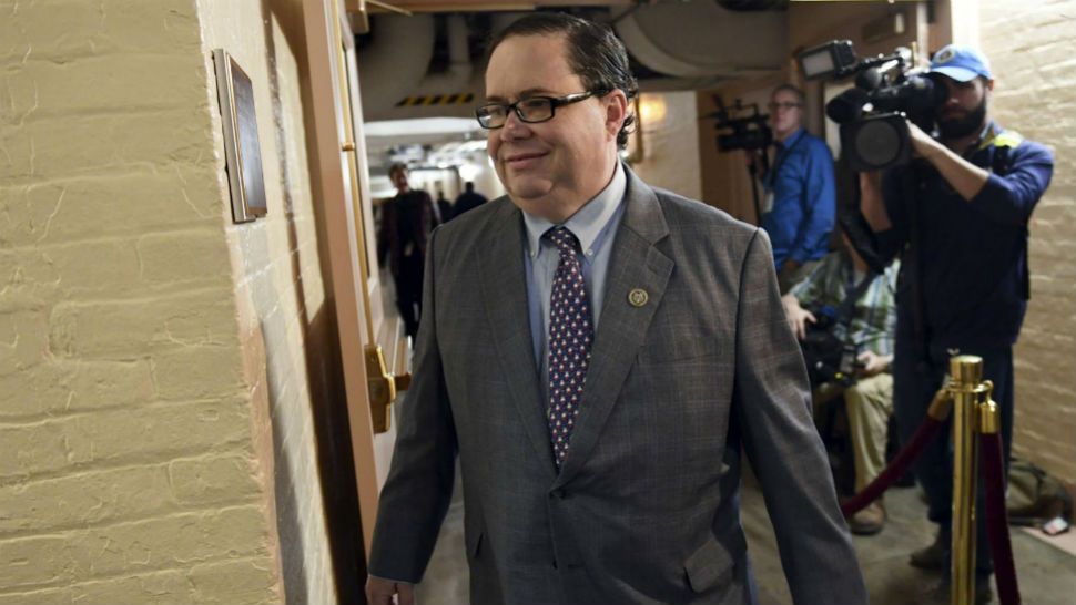 FILE - in this Dec. 19, 2017 file photo, Rep. Blake Farenthold, R-Texas, arrives on Capitol Hill in Washington. Former Rep. Farenthold has accepted a $160,000 annual salary to lobby for a Texas port, mere weeks after resigning amid fallout from a sexual harassment scandal. The Calhoun Port Authority announced Monday May 14, 2018, that Farenthold would promote its interests in Washington. He quit in April, as the House Ethics Committee investigated his using $84,000 in taxpayer funds to settle an ex-staffer's 2014 sexual harassment claim. Farenthold pledged to reimburse that, but hasn't. (AP Photo/Susan Walsh File)