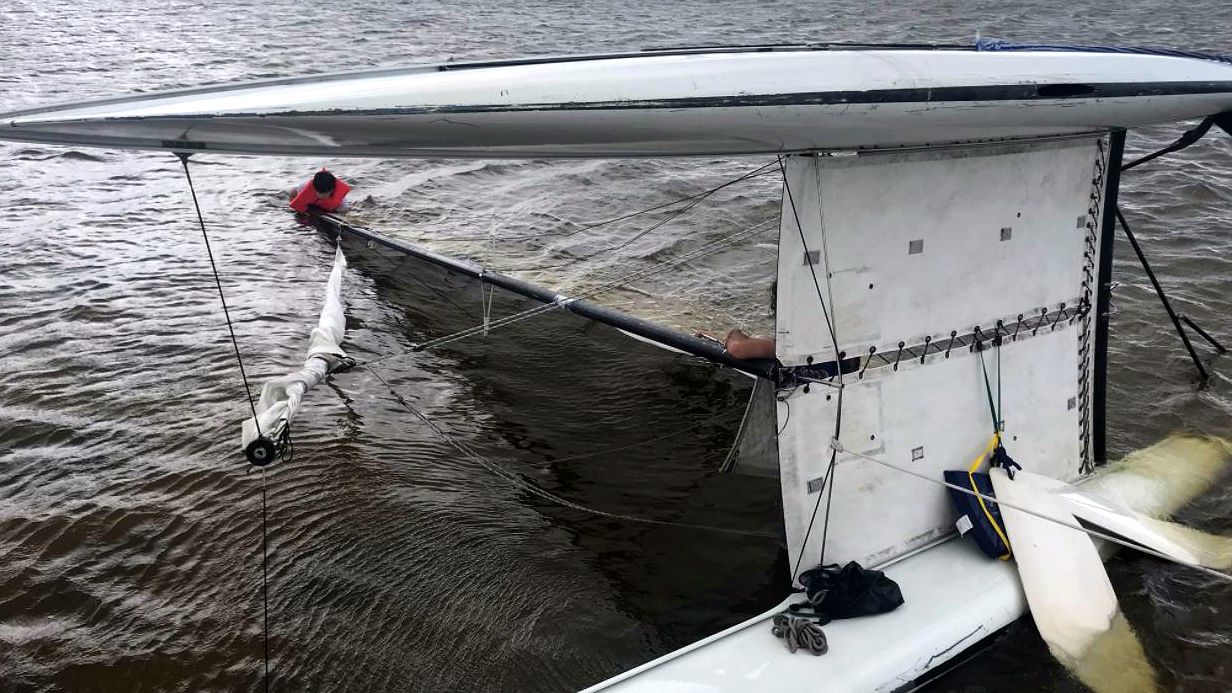 Two brothers experienced a scary moment after their boat flipped on the Banana River during gusty conditions. (Greg Pallone, staff)