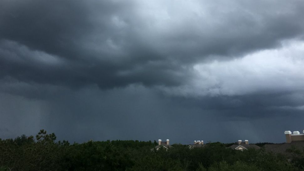 A dark storm rolls just east of Lake Buena Vista early Thursday afternoon, May 17, 2018. 