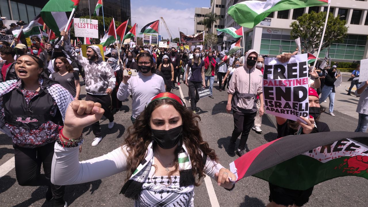 Demonstrators march to Israeli Consulate during a protest against Israel and in support of Palestinians, and marking the 73rd anniversary of what the Palestinians call the "Nakba," or catastrophe, Saturday, May 15, 2021 in the Westwood section of Los Angeles. (AP Photo/Ringo H.W. Chiu)