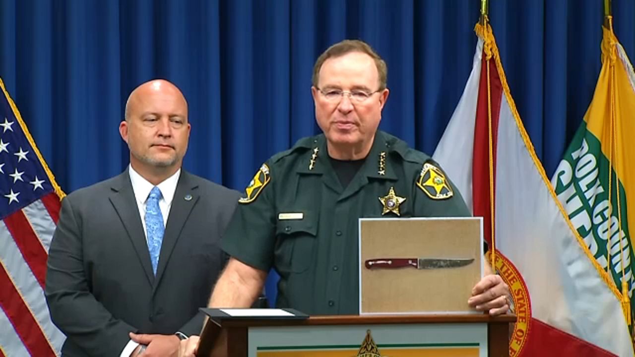 Polk County Sheriff Grady Judd shows the knife that was used in an incident where a suspect is accused of stabbing an 81-year-old man at an independent living facility in Bartow. (Spectrum News)