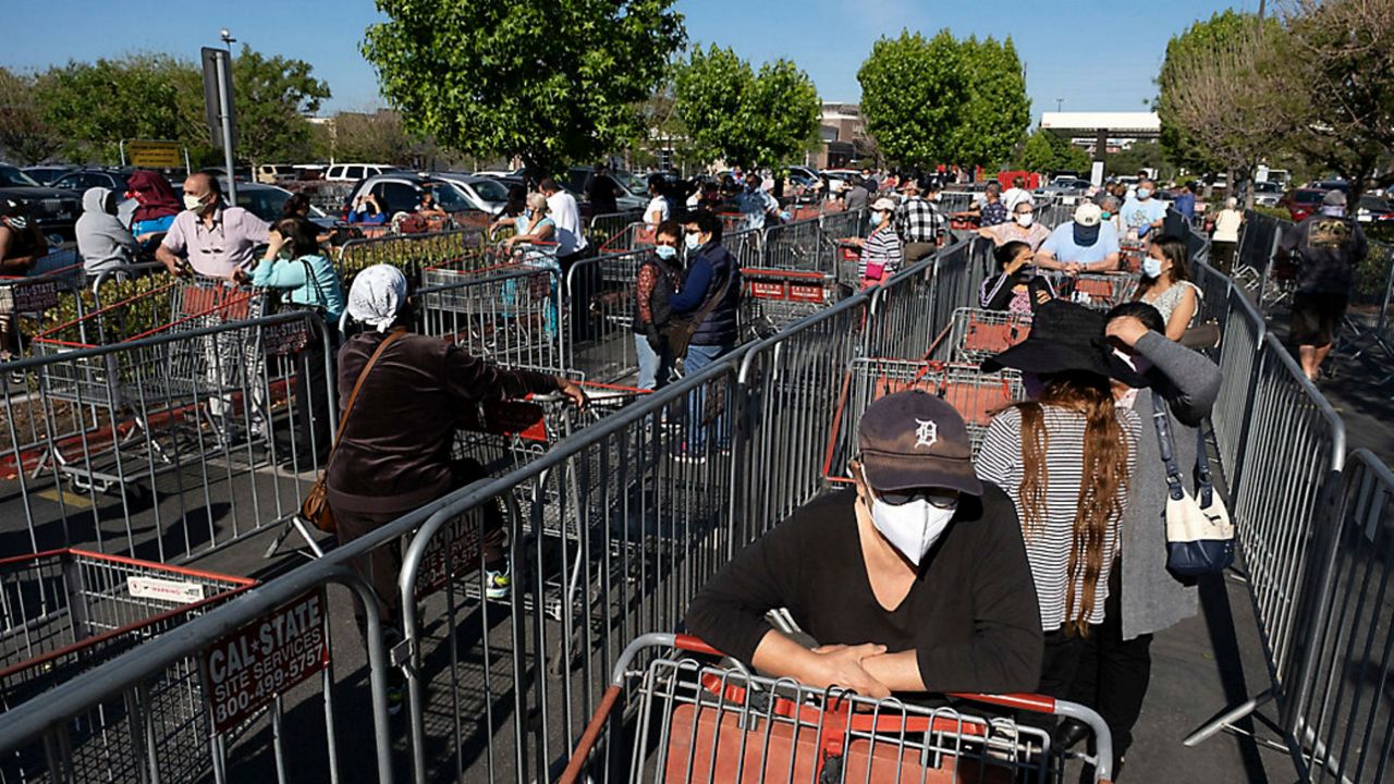 People wait in line.