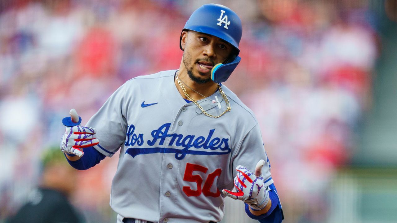 Los Angeles Dodgers' Mookie Betts reacts to hitting a solo home run against the Philadelphia Phillies during the third inning of a baseball game Saturday, May 21, 2022, in Philadelphia. (AP Photo/Chris Szagola)