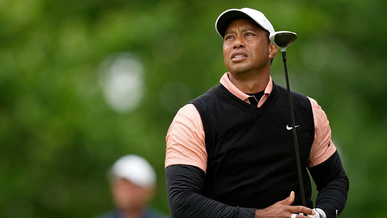 Tiger Woods watches his tee shot on the 17th hole during the third round of the PGA Championship golf tournament at Southern Hills Country Club, Saturday, May 21, 2022, in Tulsa, Okla. (AP Photo/Eric Gay)