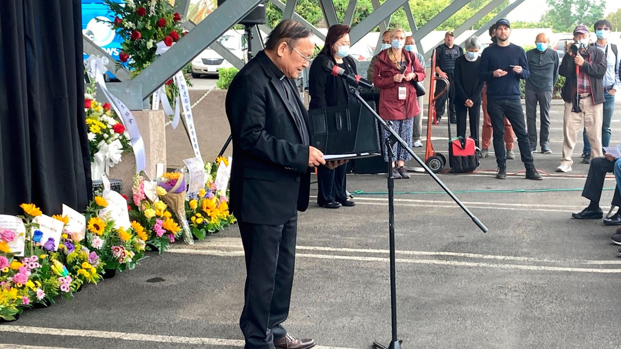 Pastor Albany Lee addresses congregants and community members on Saturday, May 21, 2022, as survivors and church leaders join in prayer and thank community members for their support nearly a week after a deadly shooting at a Taiwanese American church congregation in Laguna Woods, Calif. (AP Photo/Amy Taxin)