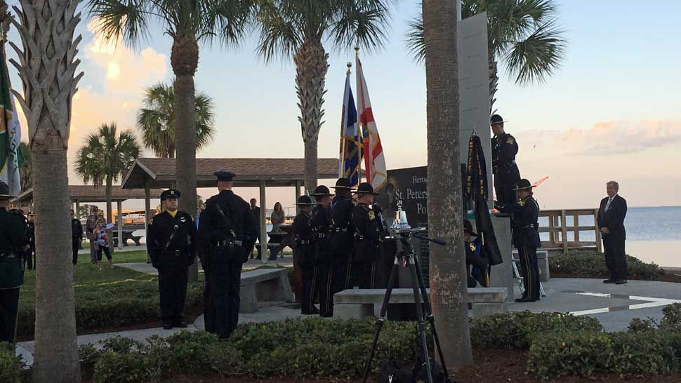 The city of St. Petersburg honors its fallen police officers at a memorial service held near the Law Enforcement Memorial at Demens Landing, Tuesday, May 21, 2019. (Laurie Davison/Spectrum Bay News 9)