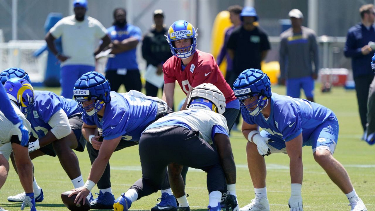 Matthew Stafford throws passes in Rams' camp practice opener