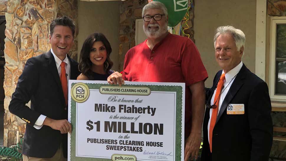 The Publishers Clearing House Prize Patrol with Valrico resident and new $1 million winner Mike Flaherty. (Trevor Pettiford/Spectrum Bay News 9)