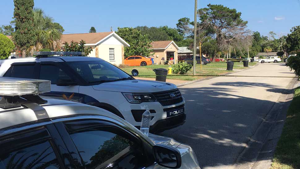 St. Petersburg Police cruisers outside the scene of a shooting Friday morning, May 24, 2019. (Laurie Davison/Spectrum Bay News 9)